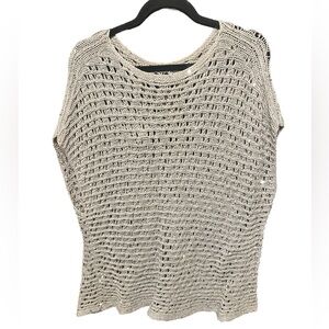 Crochet sleeveless sweater with sequins